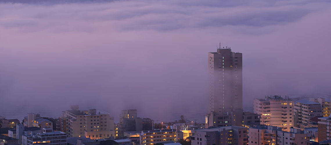 City in nightlights and fog