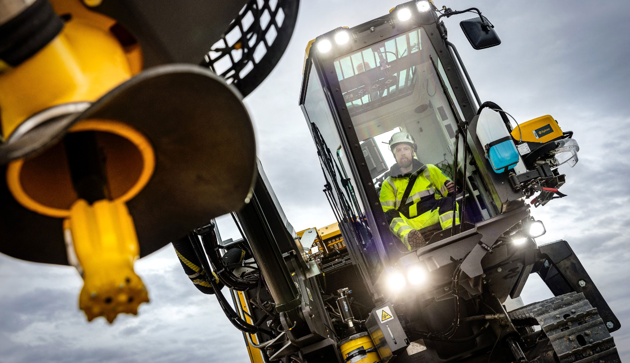 A worker driving one of Epiroc's drilling mashines.